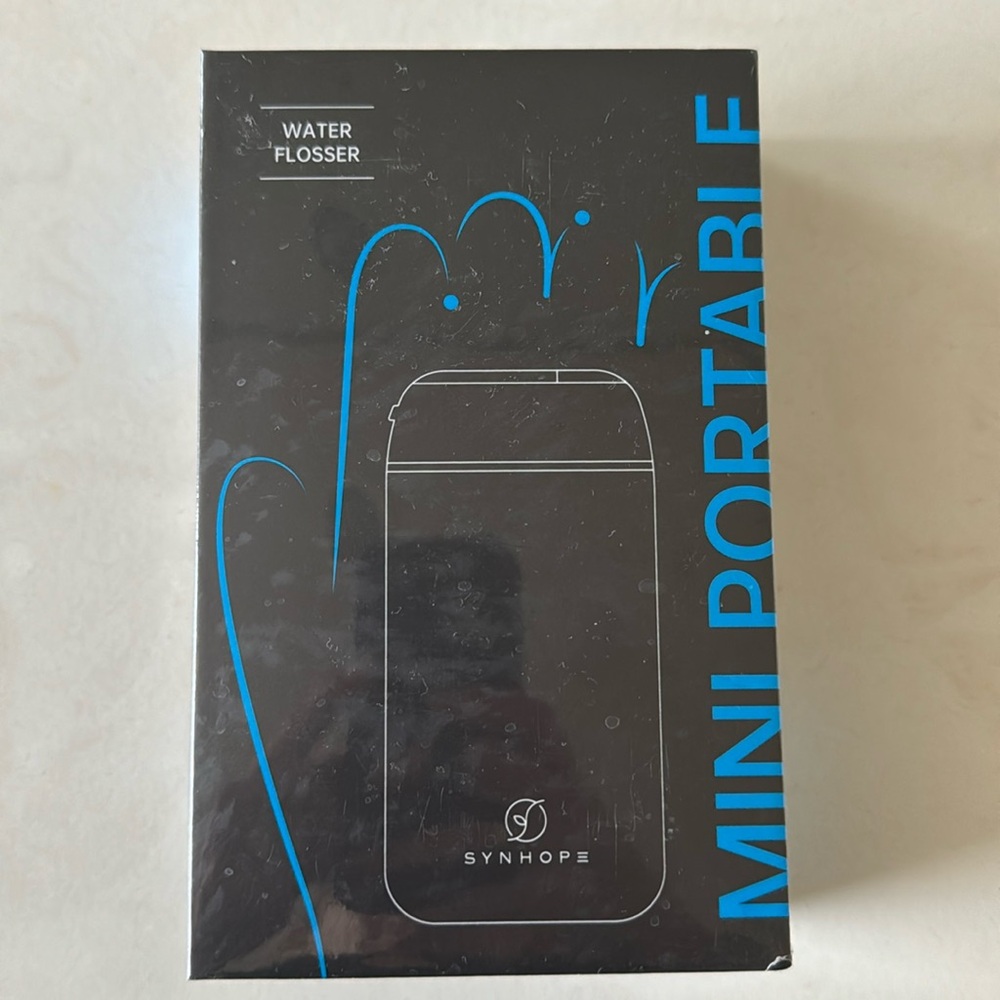 Water flosser- new in package
